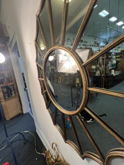 ITALIAN GILDED RESIN AND METAL FRAMED STARBURST MIRROR