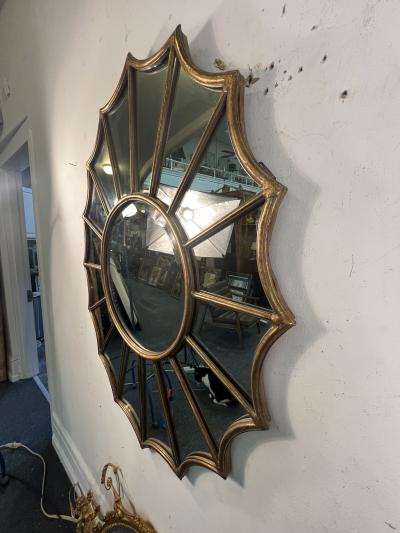 ITALIAN GILDED RESIN AND METAL FRAMED STARBURST MIRROR