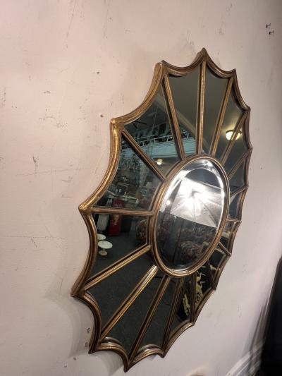 ITALIAN GILDED RESIN AND METAL FRAMED STARBURST MIRROR