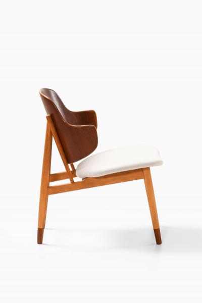 Ib Kofod Larsen Easy Chair in Beech Teak and Wool by Ib Kofod Larsen 1950s