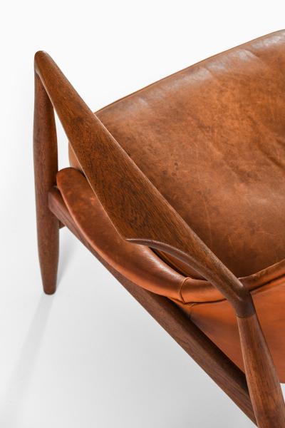 Ib Kofod Larsen Easy Chair in Leather and Teak by Ib Kofod Larsen 1950s