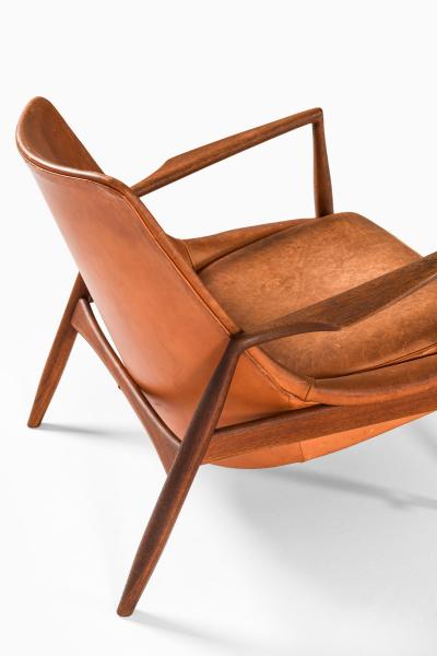 Ib Kofod Larsen Easy Chair in Leather and Teak by Ib Kofod Larsen 1950s