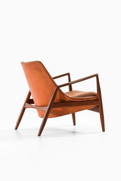 Ib Kofod Larsen Easy Chair in Leather and Teak by Ib Kofod Larsen 1950s