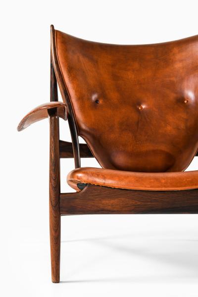 Ib Kofod Larsen Easy Chair with Matching Stool in Leather and Rosewood by Ib Kofod Larsen 1956