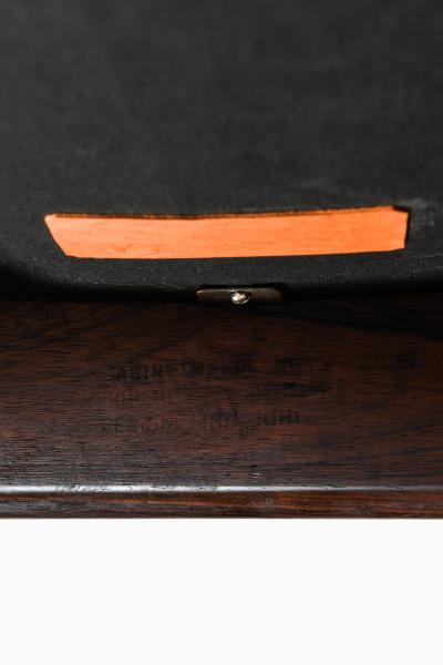 Ib Kofod Larsen Easy Chair with Matching Stool in Leather and Rosewood by Ib Kofod Larsen 1956