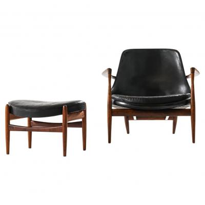 Ib Kofod Larsen Easy Chair with Matching Stool in Leather and Rosewood by Ib Kofod Larsen 1956