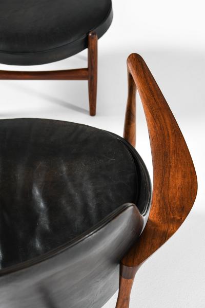 Ib Kofod Larsen Easy Chair with Matching Stool in Leather and Rosewood by Ib Kofod Larsen 1956