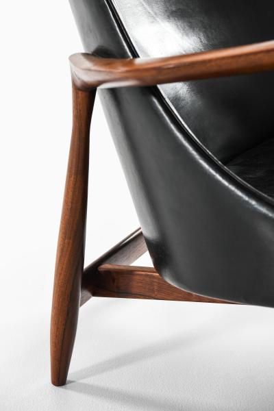 Ib Kofod Larsen Easy Chair with Matching Stool in Leather and Rosewood by Ib Kofod Larsen 1956