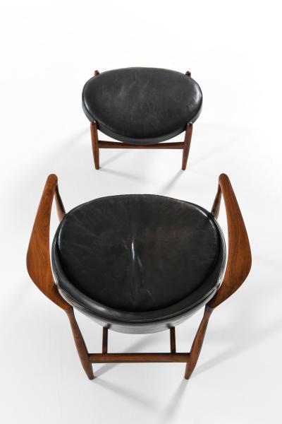 Ib Kofod Larsen Easy Chair with Matching Stool in Leather and Rosewood by Ib Kofod Larsen 1956