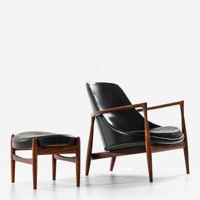Ib Kofod Larsen Easy Chair with Matching Stool in Leather and Rosewood by Ib Kofod Larsen 1956