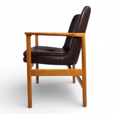Ib Kofod Larsen Fr scher leather armchair by Ib Kofod Larsen 1960