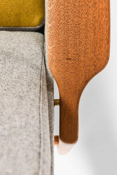 Ib Kofod Larsen Pair of Easy Chairs in Brass Oak and Wool by Ib Kofod Larsen 1950s