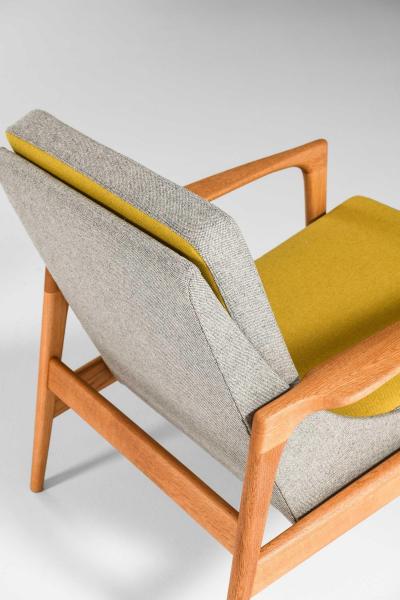 Ib Kofod Larsen Pair of Easy Chairs in Brass Oak and Wool by Ib Kofod Larsen 1950s