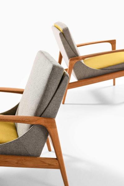 Ib Kofod Larsen Pair of Easy Chairs in Brass Oak and Wool by Ib Kofod Larsen 1950s