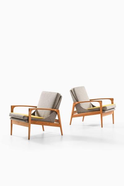 Ib Kofod Larsen Pair of Easy Chairs in Brass Oak and Wool by Ib Kofod Larsen 1950s
