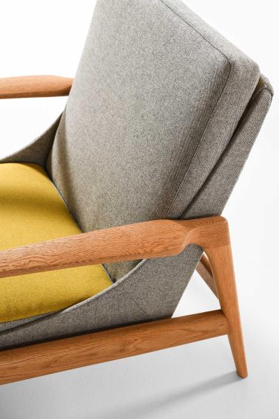 Ib Kofod Larsen Pair of Easy Chairs in Brass Oak and Wool by Ib Kofod Larsen 1950s