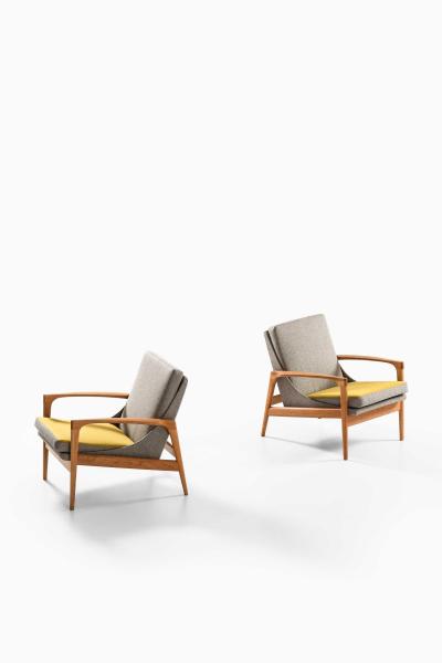 Ib Kofod Larsen Pair of Easy Chairs in Brass Oak and Wool by Ib Kofod Larsen 1950s