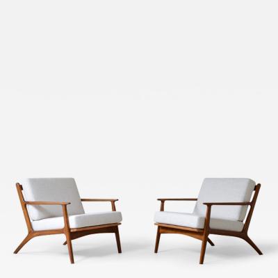 Ib Kofod Larsen Pair of teak armchairs mod 598 with upholstered fabric seat and back 