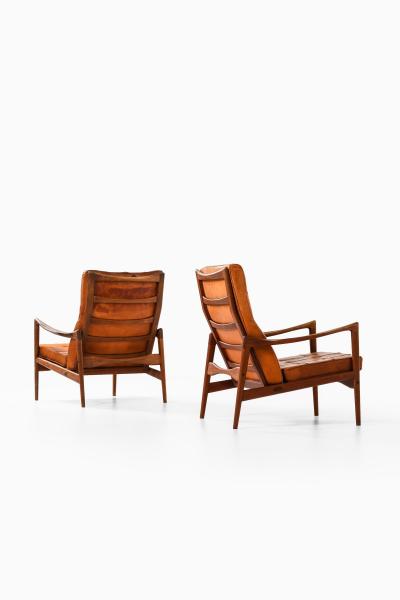 Ib Kofod Larsen Set of 2 Easy Chairs in Leather and Teak by Ib Kofod Larsen 1950s