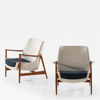 Ib Kofod Larsen Set of 2 Easy Chairs in Wool and Teak by Ib Kofod Larsen 1950s