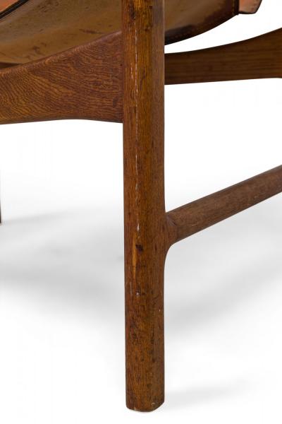 Illum Wikkels Danish Mid Century Caramel Leather and Oak Sling Design Lounge Ch