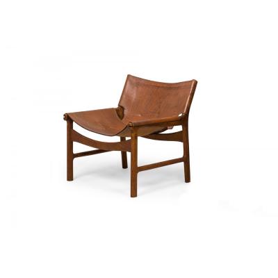 Illum Wikkels Danish Mid Century Caramel Leather and Oak Sling Design Lounge Ch