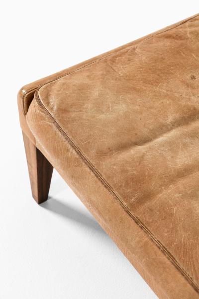 Illum Wikkels Easy Chair in Leather and Rosewood with Stool by Illum Wikkels 1960s