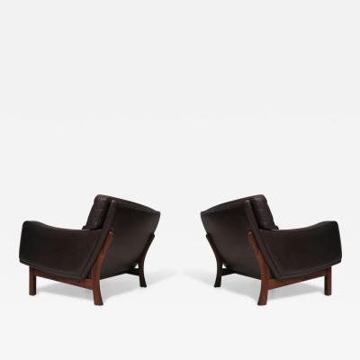 Illum Wikkels Illum Wikkelso Mid century Scandinavian Leather and Rosewood Lounge Chairs