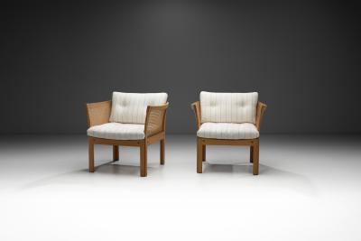 Illum Wikkelso Pair of Plexus Oak and Cane Easy Chairs by Illum Wikkels Denmark circa 1970s
