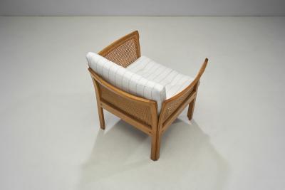 Illum Wikkelso Pair of Plexus Oak and Cane Easy Chairs by Illum Wikkels Denmark circa 1970s