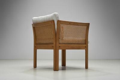 Illum Wikkelso Pair of Plexus Oak and Cane Easy Chairs by Illum Wikkels Denmark circa 1970s