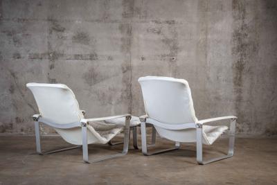 Ilmari Lappalainen ILMARI LAPPALAINEN PULKKA CHAIRS AND OTTOMAN