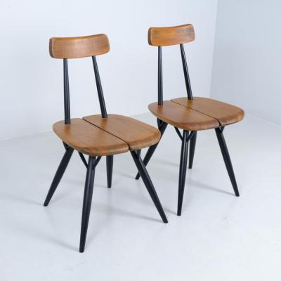 Ilmari Tapiovaara Pair of Ilmari Tapiovaara Pirkka chairs Laukaan Puu Finland 1950s