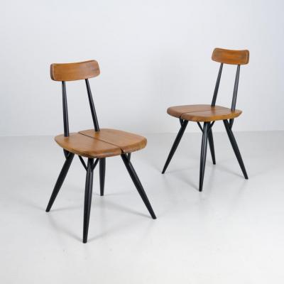 Ilmari Tapiovaara Pair of Ilmari Tapiovaara Pirkka chairs Laukaan Puu Finland 1950s