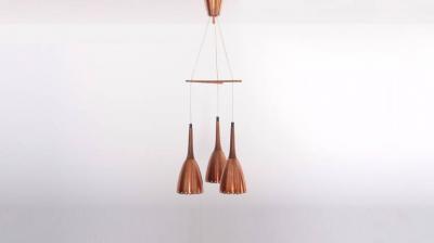 Impressive Copper Chandelier with Performated Shades and Tropic Wood Details