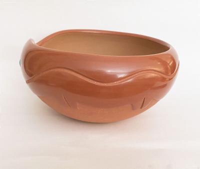 Incised red bowl by Dora Tse Pe