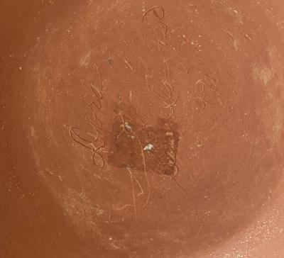 Incised red bowl by Dora Tse Pe