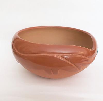 Incised red bowl by Dora Tse Pe