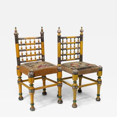 Indian Rajasthani A pair of polychrome painted chairs with gilt chord embroidery