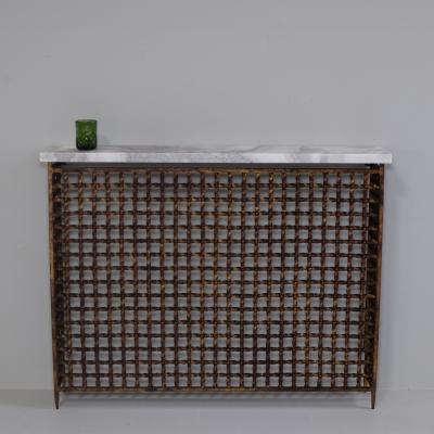 Intricate 1950s twisted iron radiator cover console with later marble top