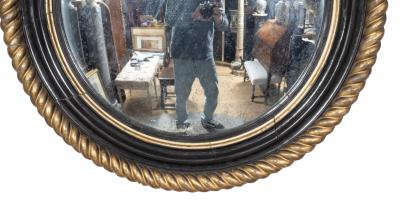 Irish Regency Giltwood And Ebonized Convex Mirror