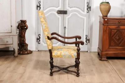 Italian Baroque Period 17th Century Walnut Armchair with Carved X Form Stretcher