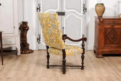 Italian Baroque Period 17th Century Walnut Armchair with Carved X Form Stretcher