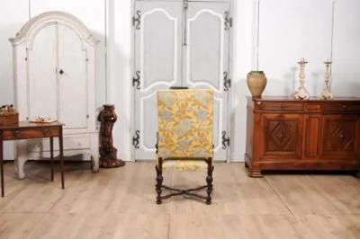 Italian Baroque Period 17th Century Walnut Armchair with Carved X Form Stretcher