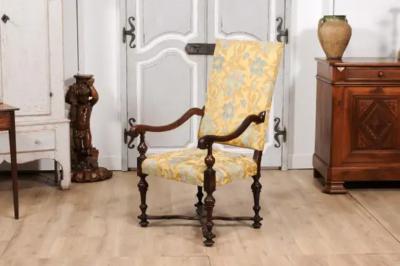 Italian Baroque Period 17th Century Walnut Armchair with Carved X Form Stretcher