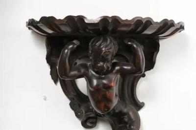 Italian Baroque Style Late 19th Century Fruitwood Wall Bracket with Carved Putto