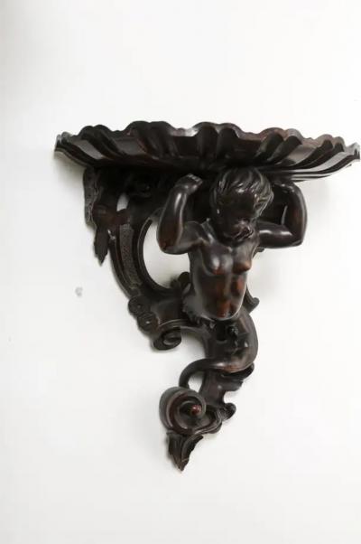Italian Baroque Style Late 19th Century Fruitwood Wall Bracket with Carved Putto