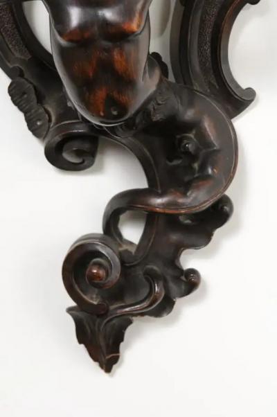 Italian Baroque Style Late 19th Century Fruitwood Wall Bracket with Carved Putto
