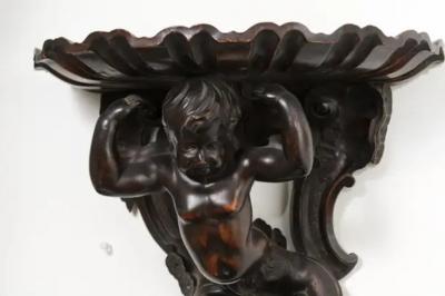 Italian Baroque Style Late 19th Century Fruitwood Wall Bracket with Carved Putto