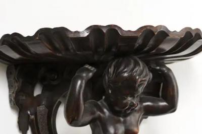 Italian Baroque Style Late 19th Century Fruitwood Wall Bracket with Carved Putto